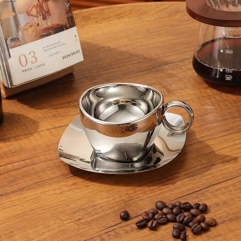 Polished stainless steel coffee cup and saucer sample