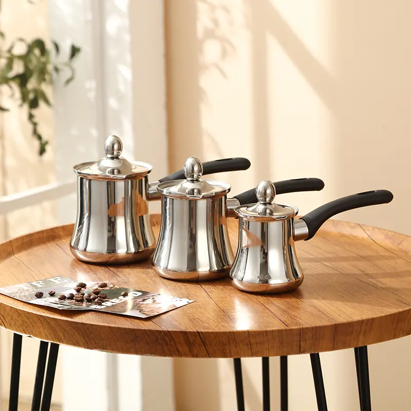 Three stainless steel coffee pot sizes with black, dark wood and light wood handles