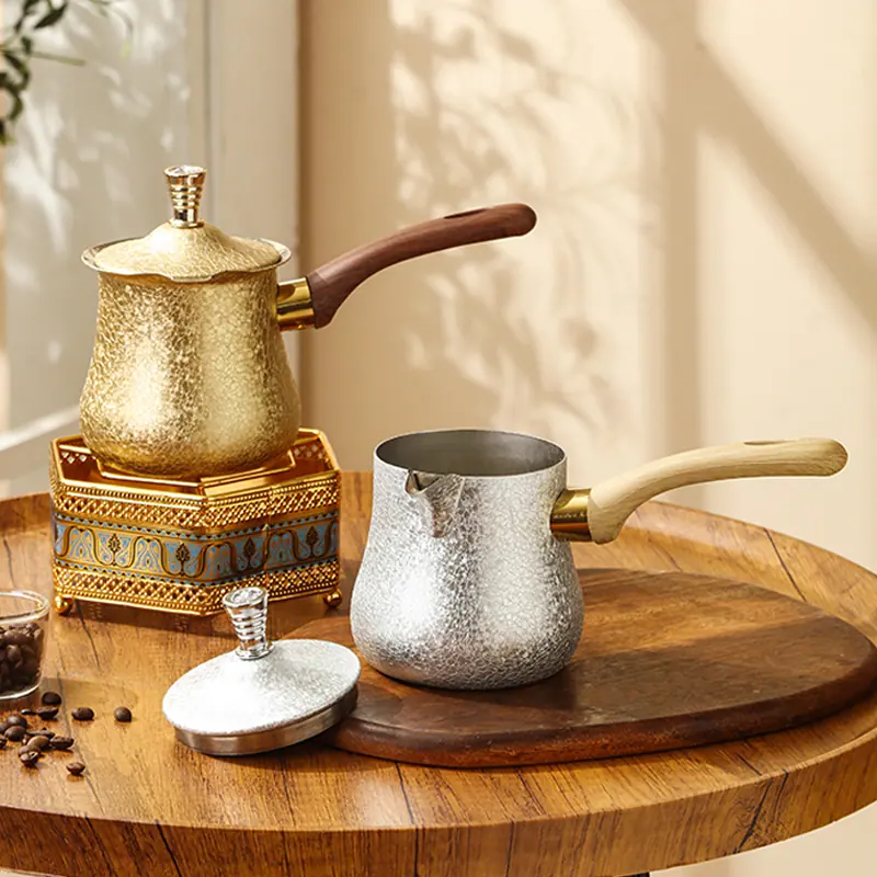 Gold and silver hammered-finish Style 03 coffee pot sample concepts